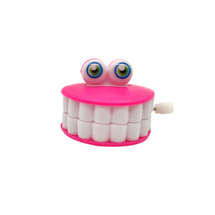 لعب الأسنان البلاستيكية مضحك الرياح لألعاب الأسنان